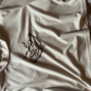 I don’t know the brand the tag is gone im assuming it’s at shein shirt.